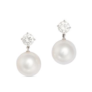 A PAIR OF DIAMOND AND PEARL DROP EARRINGS in 18ct white gold, each set with a round brilliant cut...