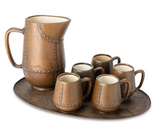 A Clewell copper-clad ceramic cider set