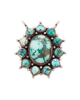 A Southwest sterling silver and turquoise pendant