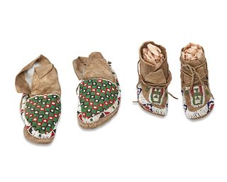 Two pairs of Plains beaded hide moccasins
