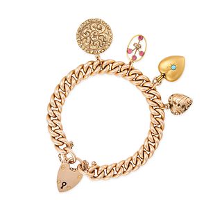 AN ANTIQUE CHARM PADLOCK BRACELET in 15ct and 9ct yellow gold, the curb chain suspending four cha...