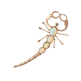 AN ANTIQUE OPAL SCORPION BROOCH in 14ct rose gold, the body set with a row of four oval cabochon ...