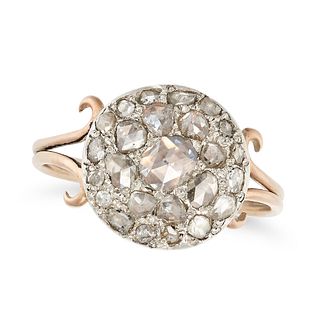AN ANTIQUE DIAMOND CLUSTER RING in yellow gold, set with a cluster of rose cut diamonds on a bifu...