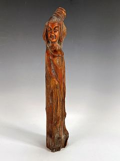 CARVED WOODEN WOMAN