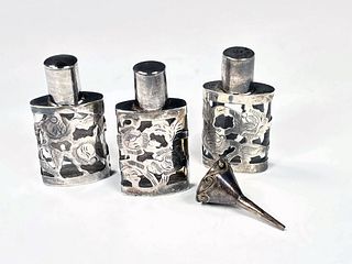 THREE SMALL STERLING OVERLAY PERFUME BOTTLES WITH FUNNEL 