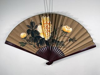 LARGE CHINESE HAND-PAINTED FAN OF YELLOW PEONIES ON HEAVY BROWN PAPER