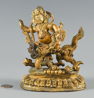 Gilt bronze figure on dragon