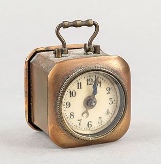 Travel alarm clock around 1900