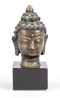 Buddha head, China, 20th c., brass