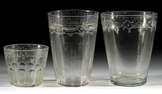 ASSORTED FREE-BLOWN / PATTERN-MOLDED ENGRAVED GLASS FLIP GLASSES, LOT OF THREE