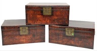 Set of four Leather Wrapped Chinese Lift top Trunks