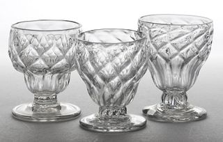 PATTERN-MOLDED DIAMOND-QUILT GLASS FOOTED OPEN SALTS, LOT OF THREE