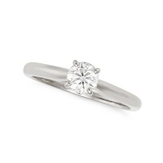 CARTIER, A SOLITAIREÂ DIAMOND ENGAGEMENT RING in platinum, set with a round brilliant cut diamond ...