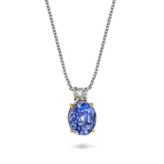 A SAPPHIRE AND DIAMOND PENDANT NECKLACE in 18ct yellow and white gold, the pendant set with an ov...