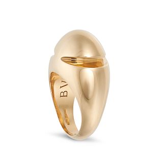 BULGARI, A CABOCHON RING in 18ct yellow gold, the domed body with a cut out design,Â signed BVLGAR...