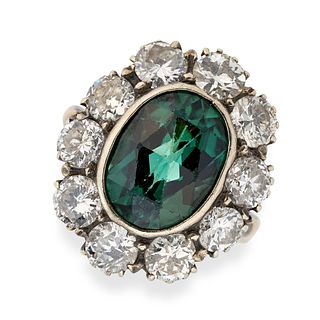 AN ANTIQUE PASTE AND DIAMOND CLUSTER RING in 18ct yellow gold, set with a mixed cut green paste s...