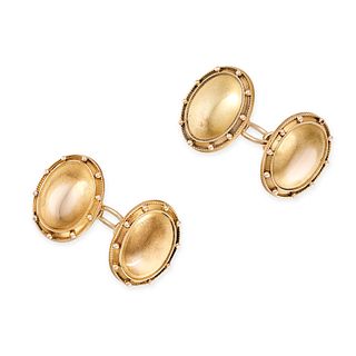 A PAIR OF ANTIQUE GOLD CUFFLINKS in 15ct yellow gold, each oval face accented by beaded and twist...