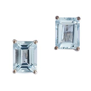 A PAIR OF AQUAMARINE STUD EARRINGS in 18ct white gold, each set with an octagonal step cut aquama...