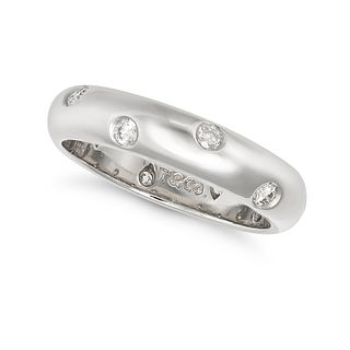TIFFANY & CO., A DIAMOND ETOILE RING in platinum, the band set with staggered round brilliant cut...