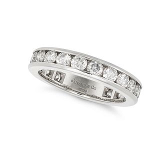 TIFFANY & CO, A DIAMOND FULL ETERNITY RING in platinum, set all around with a row of round brilli...