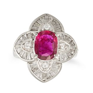 A RUBY AND DIAMOND CLUSTER RING in platinum, set with an oval cut ruby of 1.31 carats in a stylis...