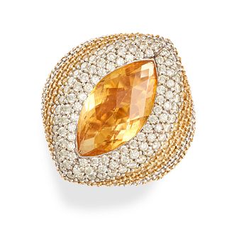 A CITRINE, YELLOW SAPPHIRE AND DIAMOND DRESS RING in yellow gold, set with a marquise shaped face...