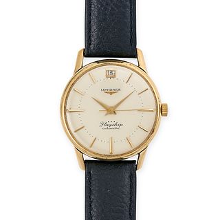 LONGINES, A VINTAGE FLAGSHIP AUTOMATIC DATE WRISTWATCH in 9ct yellow gold, circa 1960s, silver di...