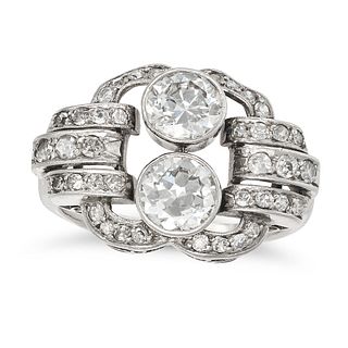A DIAMOND DRESS RING set with two old European cut diamonds of approximately 0.61 and 0.69 carats...