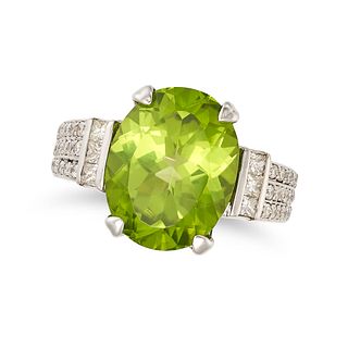A PERIDOT AND DIAMOND DRESS RING in 18ct white gold, set with an oval cut peridot of 5.67 carats ...