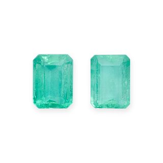 A PAIR OF UNMOUNTED UNTREATED COLOMBIAN EMERALDS octagonal step cut, 1.77 carats each. Accompanie...