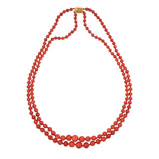 A TWO ROW CORAL BEAD NECKLACE in 9ct yellow gold, comprising two rows of graduated coral beads ra...