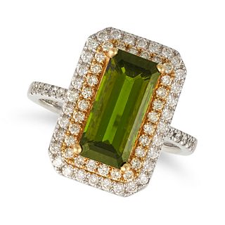 A GREEN TOURMALINE AND DIAMOND RING in 18ct white and yellow gold, set with an elongated octagona...