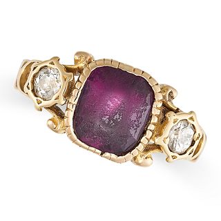AN ANTIQUE AMETHYST AND DIAMOND RING in yellow gold, set with a cushion cut amethyst between two ...