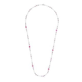 A PINK TOURMALINE AND TANZANITE CHAIN NECKLACE in 18ct white gold, the trace chain set with polis...