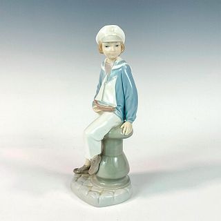 Boy With Yacht 1004810 - Lladro Porcelain Figurine