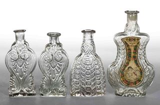 BLOWN-MOLDED FIGURED COMMERCIAL COLOGNE BOTTLES, LOT OF FOUR