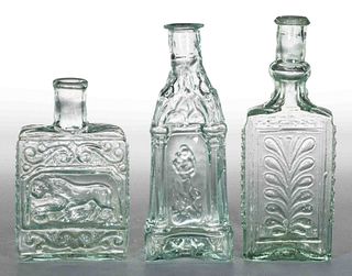 BLOWN-MOLDED FIGURED COMMERCIAL COLOGNE BOTTLES, LOT OF THREE