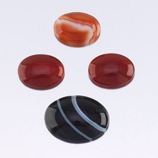 Four Unmounted 38.85 Carat Oval Cabochon Cut Carnelian and Agate Gems 