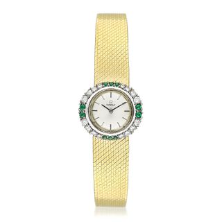Omega 18K Gold Ladies Bracelet Watch With Diamonds and Emeralds