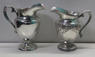 STERLING. Grouping of Sterling Water Pitchers.