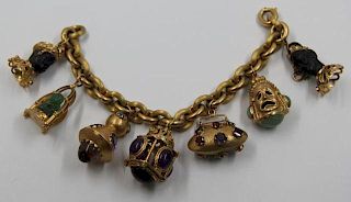 JEWELRY. Italian 18kt Gold Charm Bracelet with 7