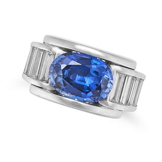 A SAPPHIRE AND DIAMOND RING in 18ct white gold, set with an oval cut sapphire of approximately 2....