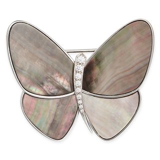 VAN CLEEF & ARPELS, A MOTHER OF PEARL AND DIAMOND BUTTERFLY BROOCH in white gold, designed as a b...