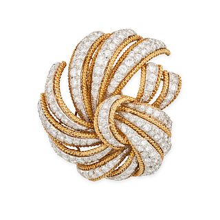 DAVID WEBB, A VINTAGE DIAMOND BROOCH in 18ct yellow gold and platinum, the scrolling body pave se...