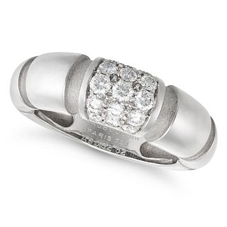 MAUBOUSSIN, A DIAMOND NADJA RING in 18ct white gold, the central section pave set with round bril...