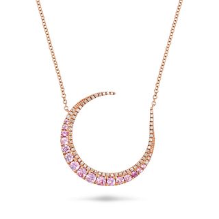 A PINK SAPPHIRE AND DIAMOND CRESCENT MOON NECKLACE in rose gold, the pendant designed as a cresce...