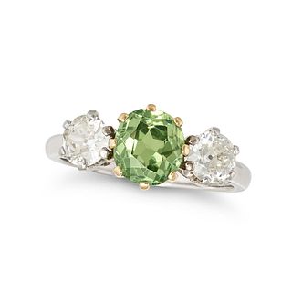A DEMANTOID GARNET AND DIAMOND THREE STONE RING in platinum and 18ct yellow gold, set with a cush...