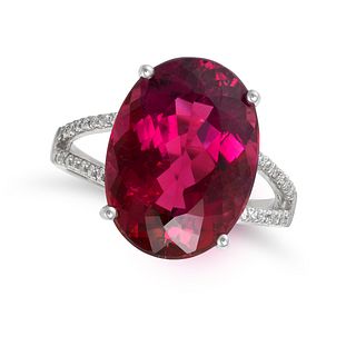 A RUBELLITE TOURMALINE AND DIAMOND RING in 18ct white gold, set with an oval cut rubellite tourma...