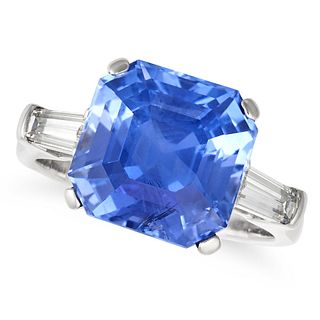 A CEYLON NO HEAT SAPPHIRE AND DIAMOND RING in 18ct white gold, set with an octagonal step cut sap...