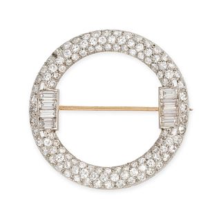 AN ART DECO DIAMOND CIRCLE BROOCH in platinum, designed as an openwork circle set with old Europe...